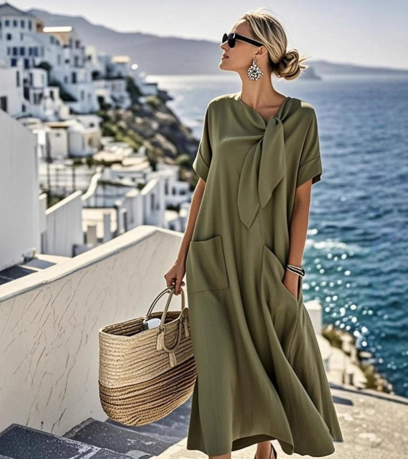 ANITA | Abito ampio con fiocco al collo e tasche pratiche