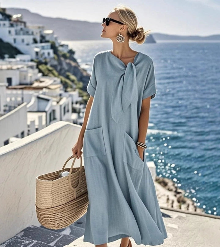 ANITA | Abito ampio con fiocco al collo e tasche pratiche