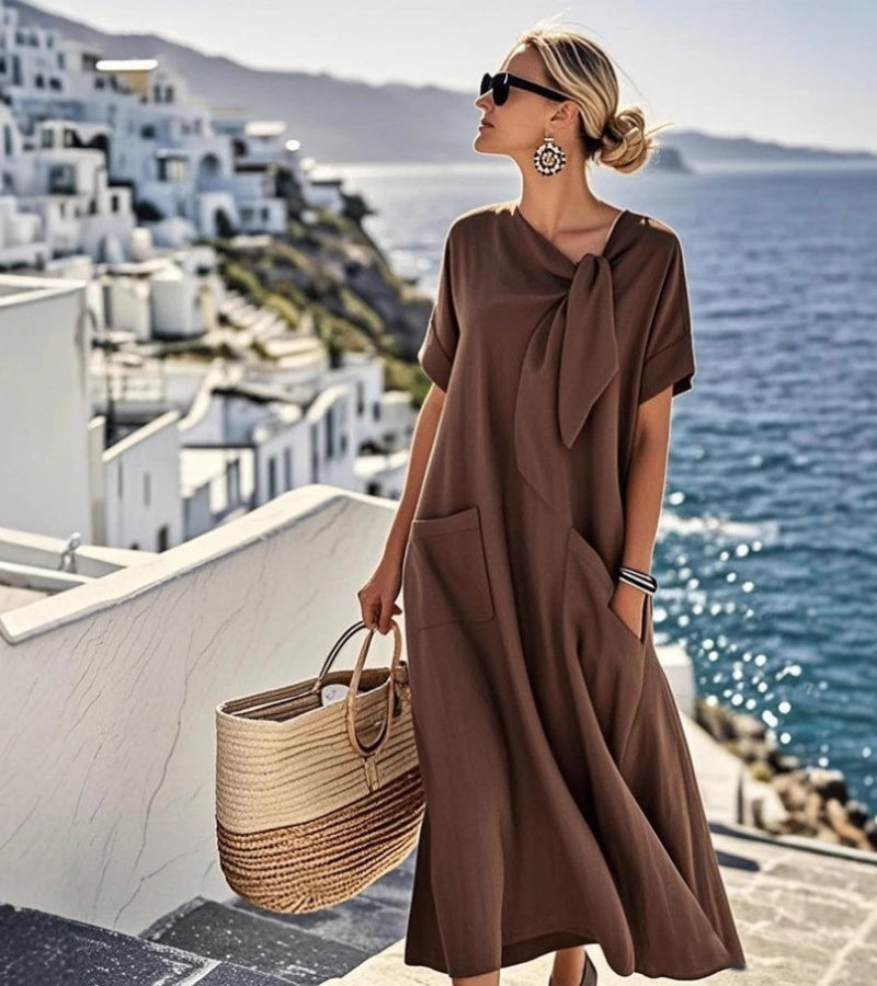 ANITA | Abito ampio con fiocco al collo e tasche pratiche